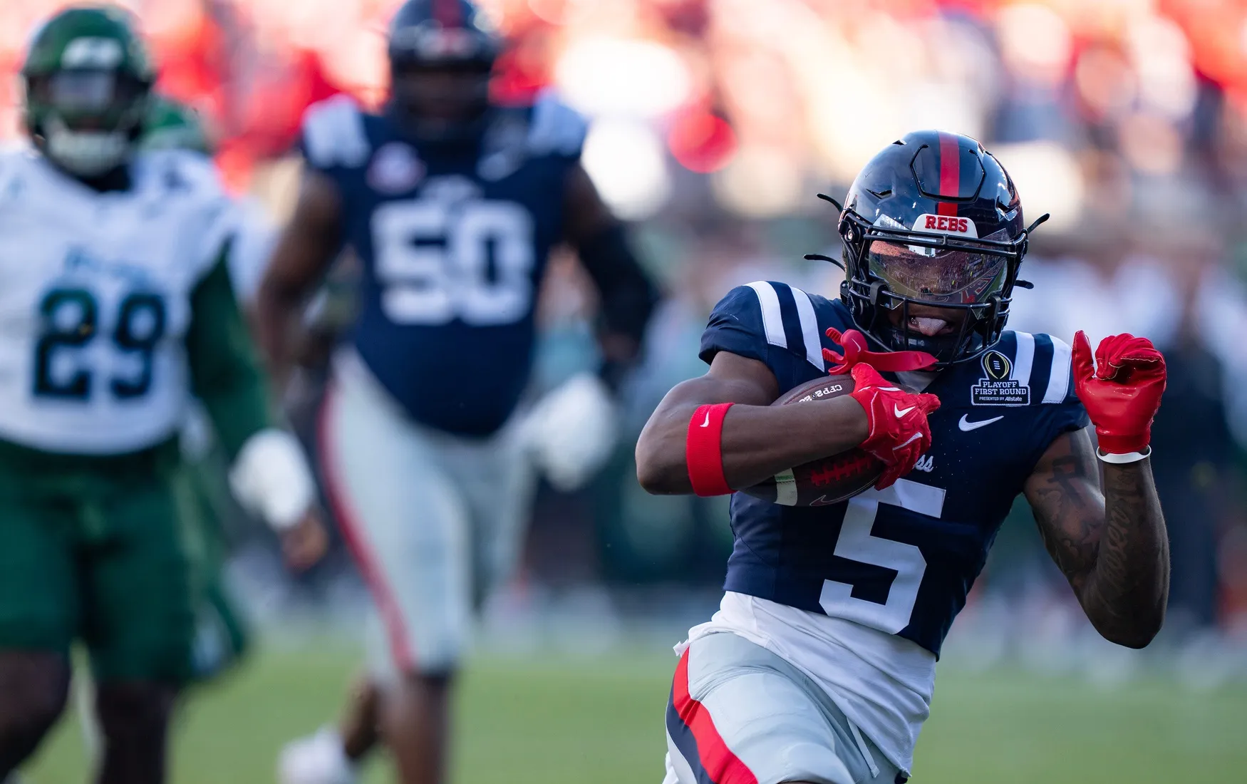 Ole Miss Running Back Kewan Lacy Escapes Serious Injury in CFP Win