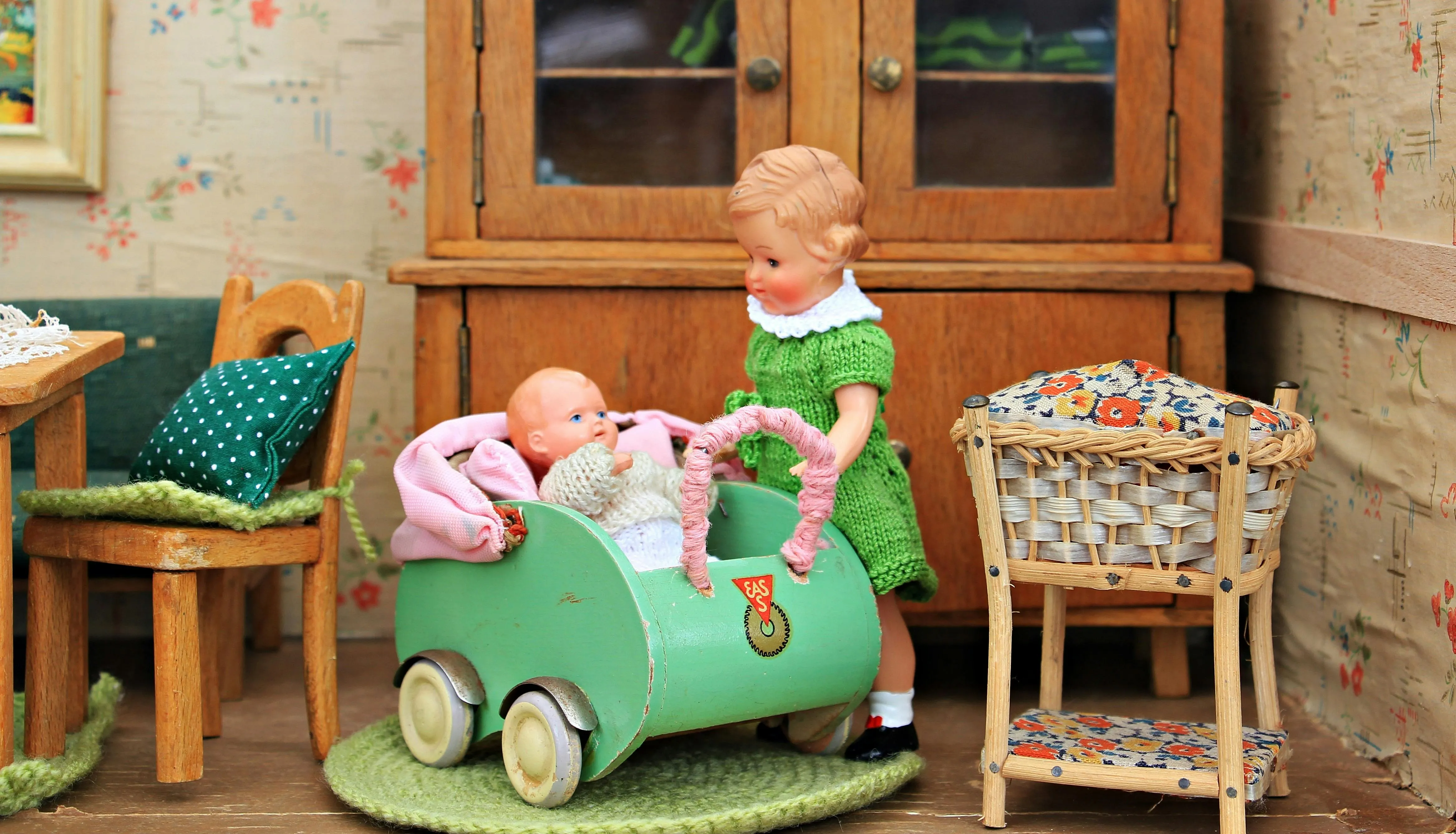 baby doll toy lying on the floor on Pexels 