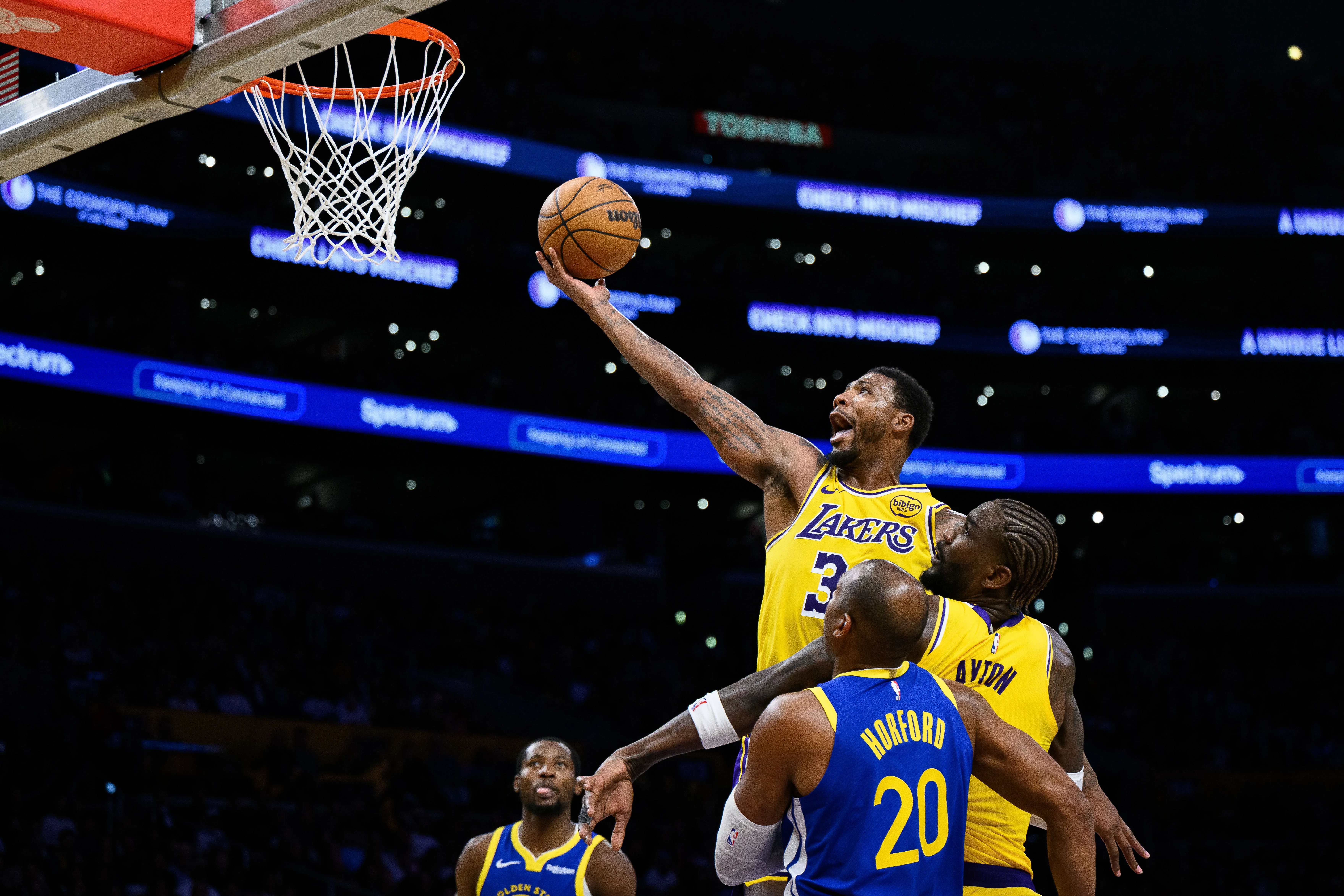 Oct 21, 2025; Los Angeles, California, USA; Los Angeles Lakers guard Marcus Smart (36) shoots during the first half against the Golden State Warriors at Crypto.com Arena.