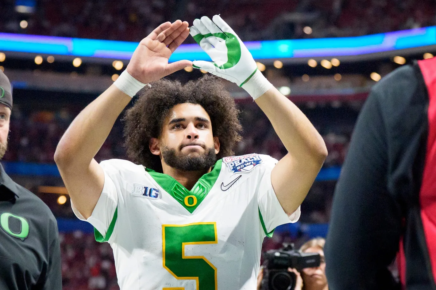Oregon Ducks Fall to Indiana in Peach Bowl, Dante Moore Faces Key Decision