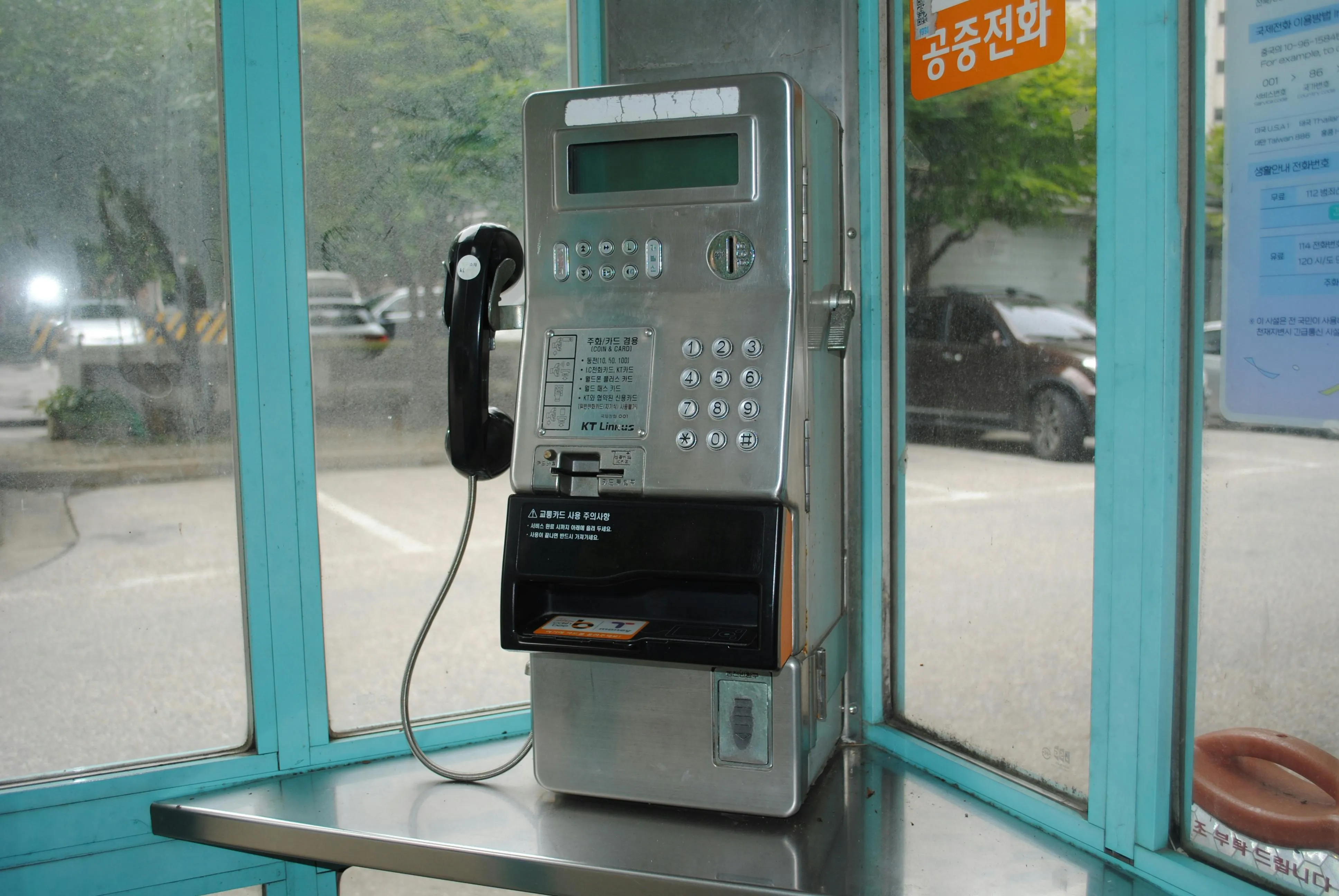 13 Public Phone Booth Moments You’ll Never See Again