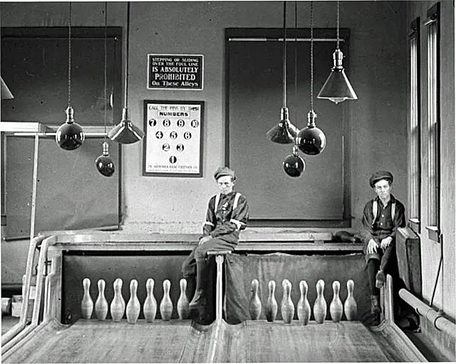Two pinboys (human pinsetters)