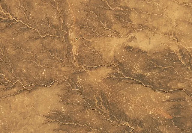 NASA Earth Observatory images by Michala Garrison, using Landsat data from the U.S. Geological Survey. Story by Adam Voiland on Wikimedia Commons