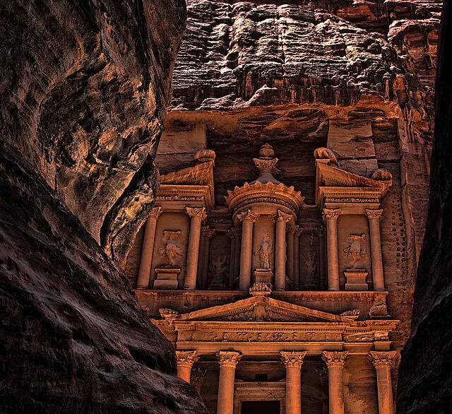 illustrative cut-away of ancient city built within rock beneath a modern settlement