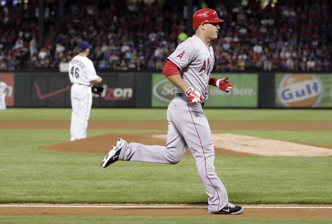 Sep 28, 2012; Arlington, TX, USA; Los Angeles Angels center fielder Mike Trout (27) rounds the bases after hitting a home run