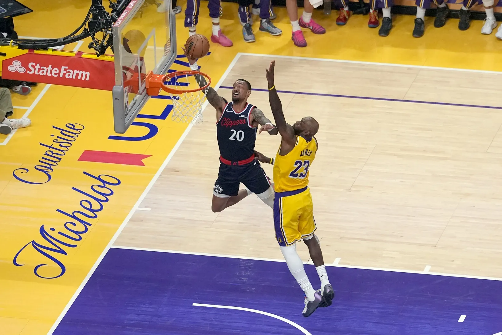 Clippers Lose John Collins to Head Injury in Tight Battle With Lakers