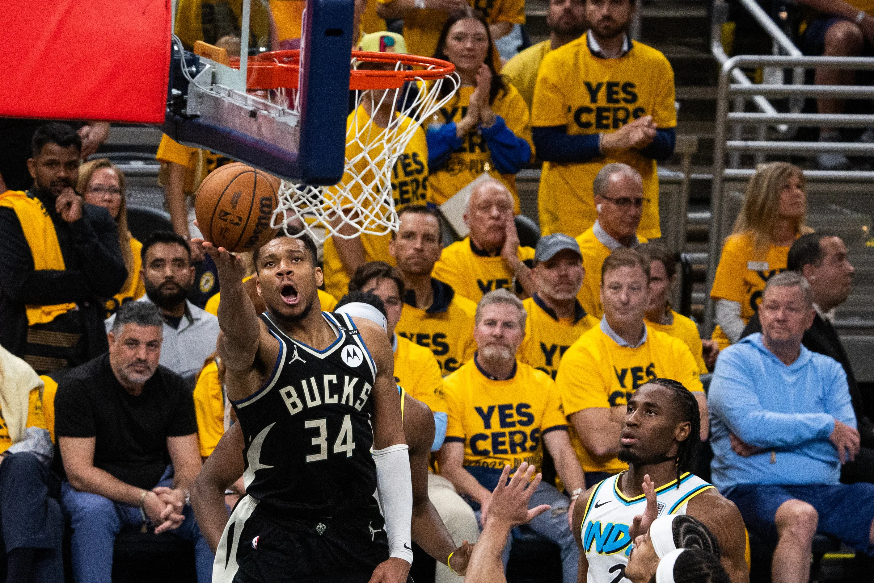 15 Jaw-Dropping Photos That Show Giannis Defying Physics