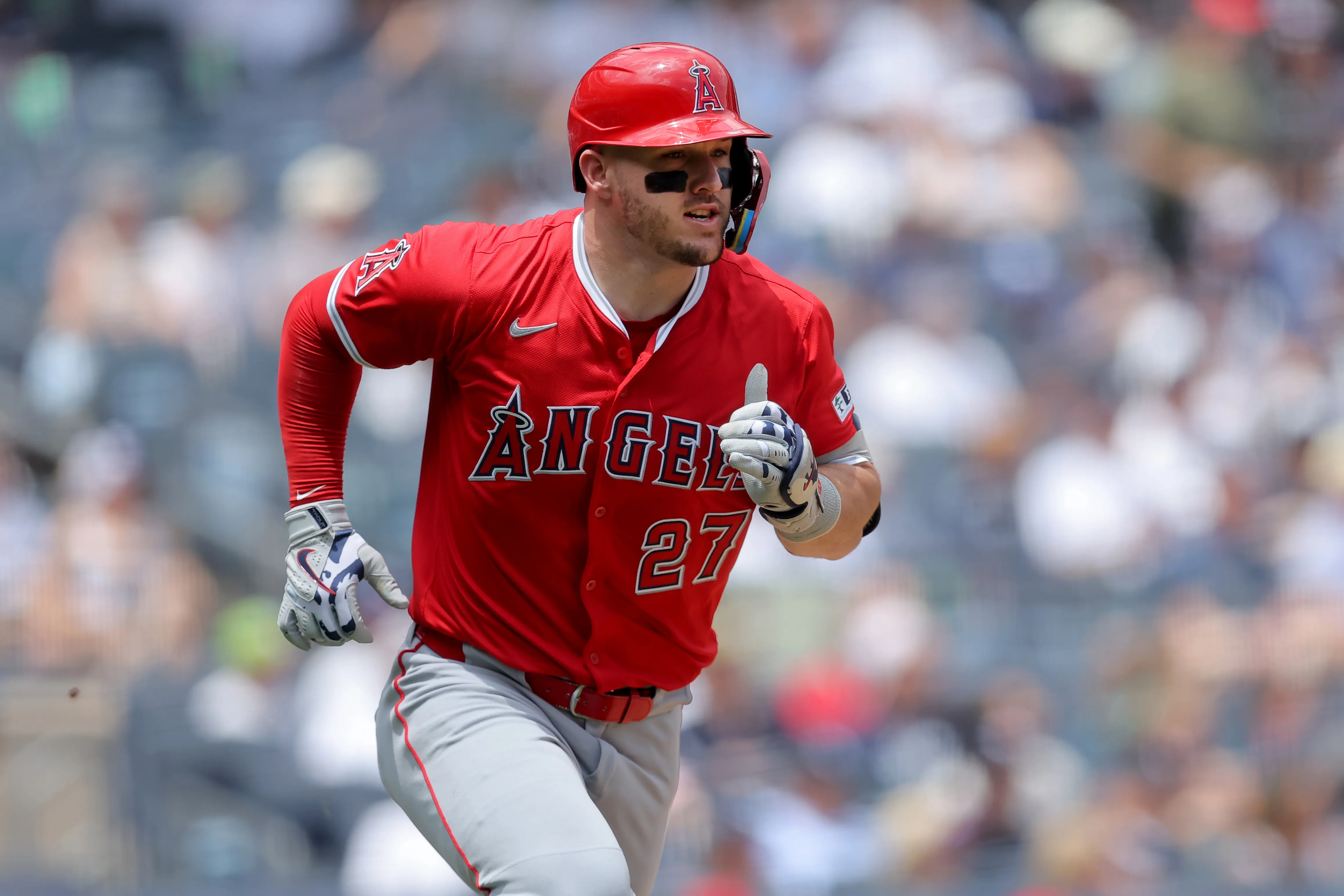 Jun 19, 2025; Bronx, New York, USA; Los Angeles Angels right fielder Mike Trout (27) rounds the bases after hitting a solo home run against the New York Yankees during the first inning at Yankee Stadium