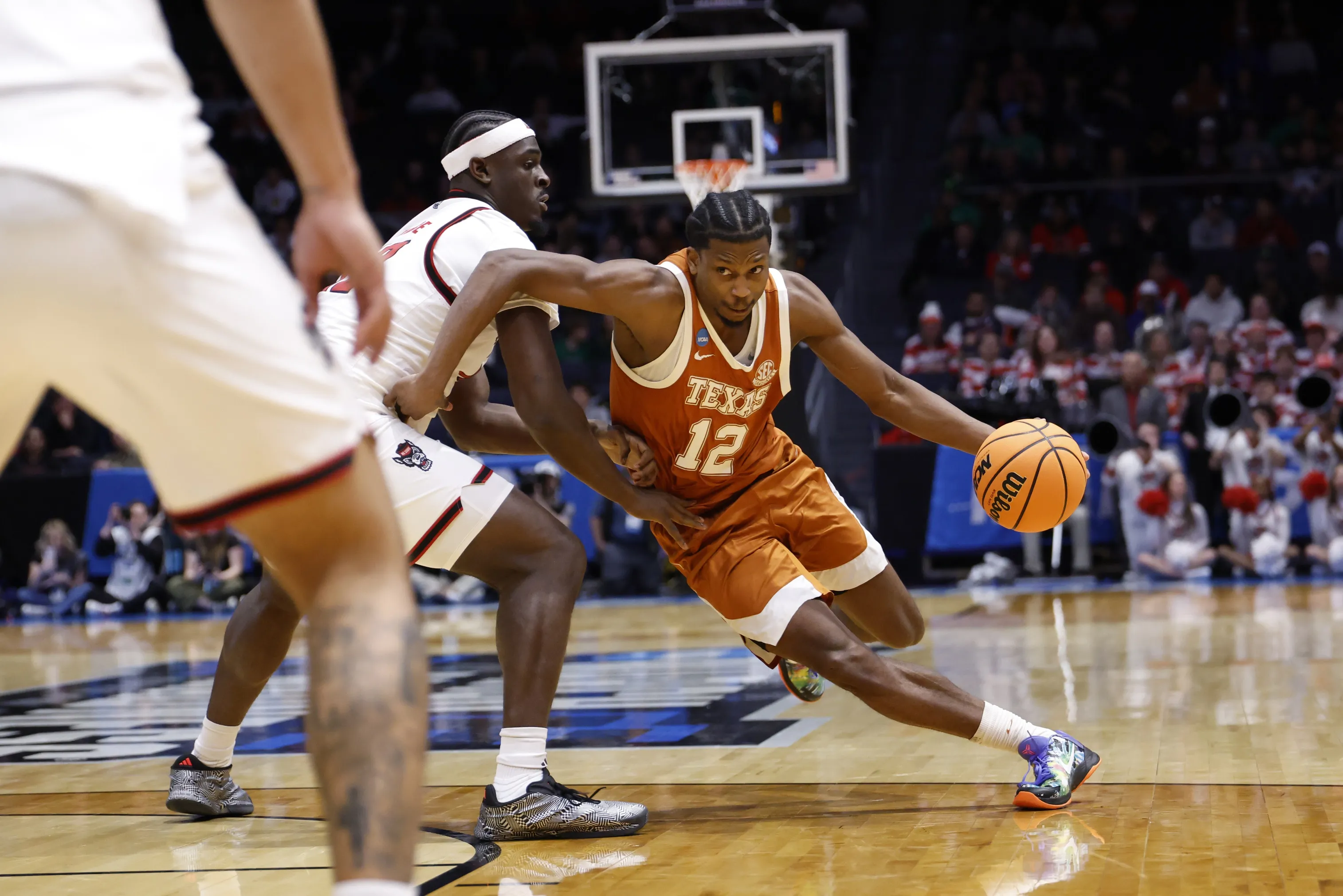 Mark’s Defining Moment Carries Texas Past NC State in March Thriller