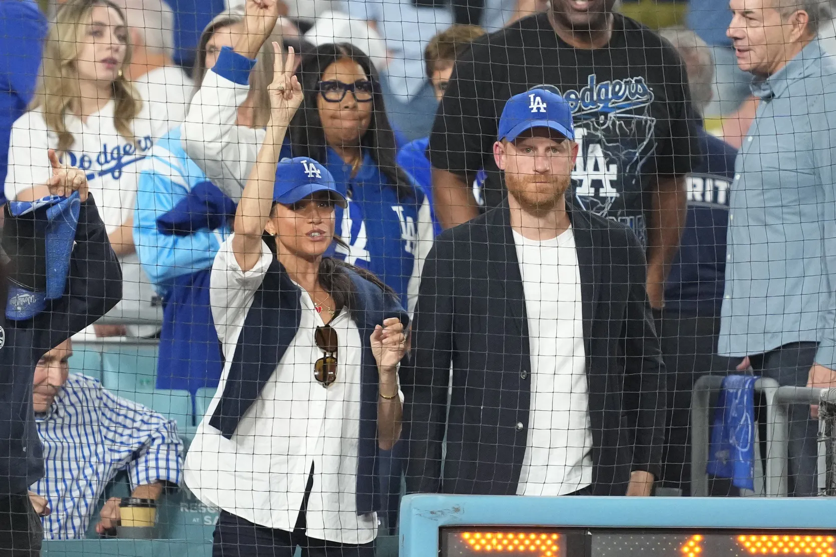Prince Harry and Meghan Markle Cheer Dodgers Amid Rumors of U.K. Return