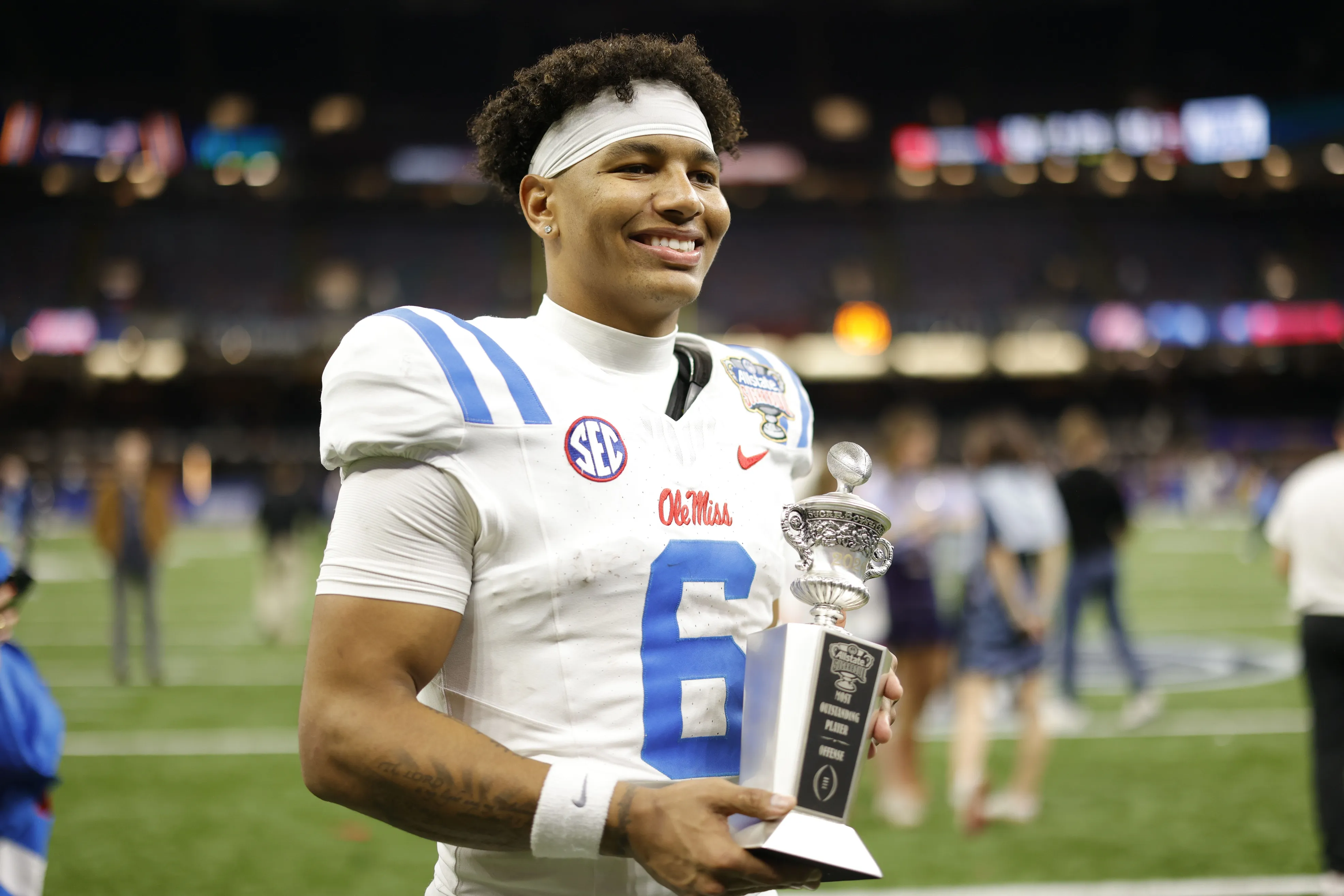 Ole Miss Faces Uncertainty as Quarterback Trinidad Chambliss Seeks Extra Year