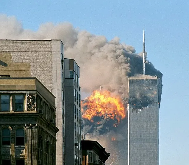 UA_Flight_175_hits_WTC_south_tower_9-11.jpeg: Flickr user TheMachineStops (Robert J. Fisch) derivative work: upstateNYer on Wikimedia Commons