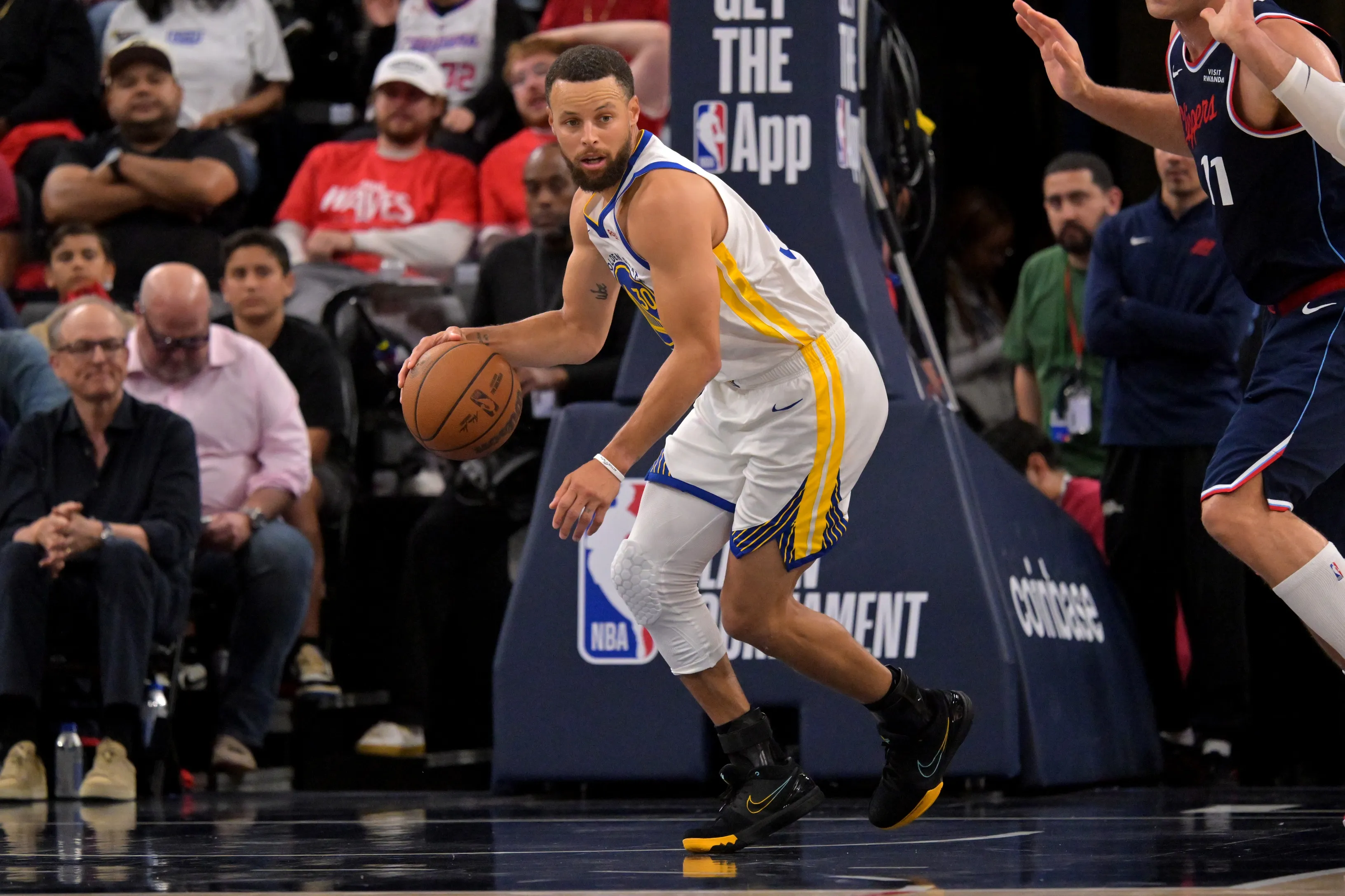 Warriors Ride Curry’s Late Surge to Edge Clippers in Play-In Thriller
