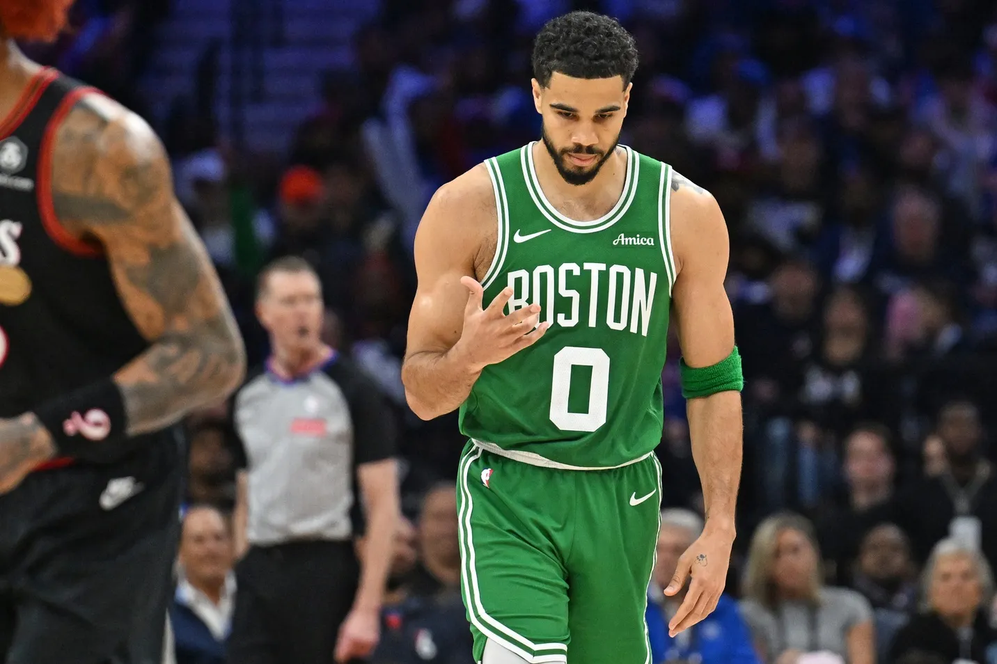 Tatum’s Comeback Fuels Celtics Push While He Supports Injured DiVincenzo