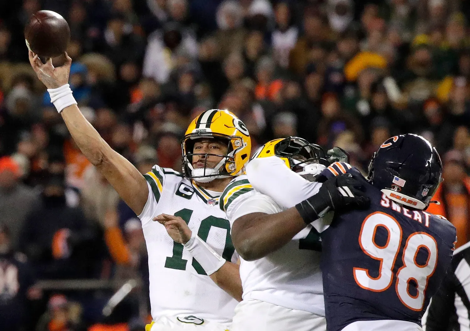 Edwards Injury Shadows Bears’ Playoff Return in Loss to Packers