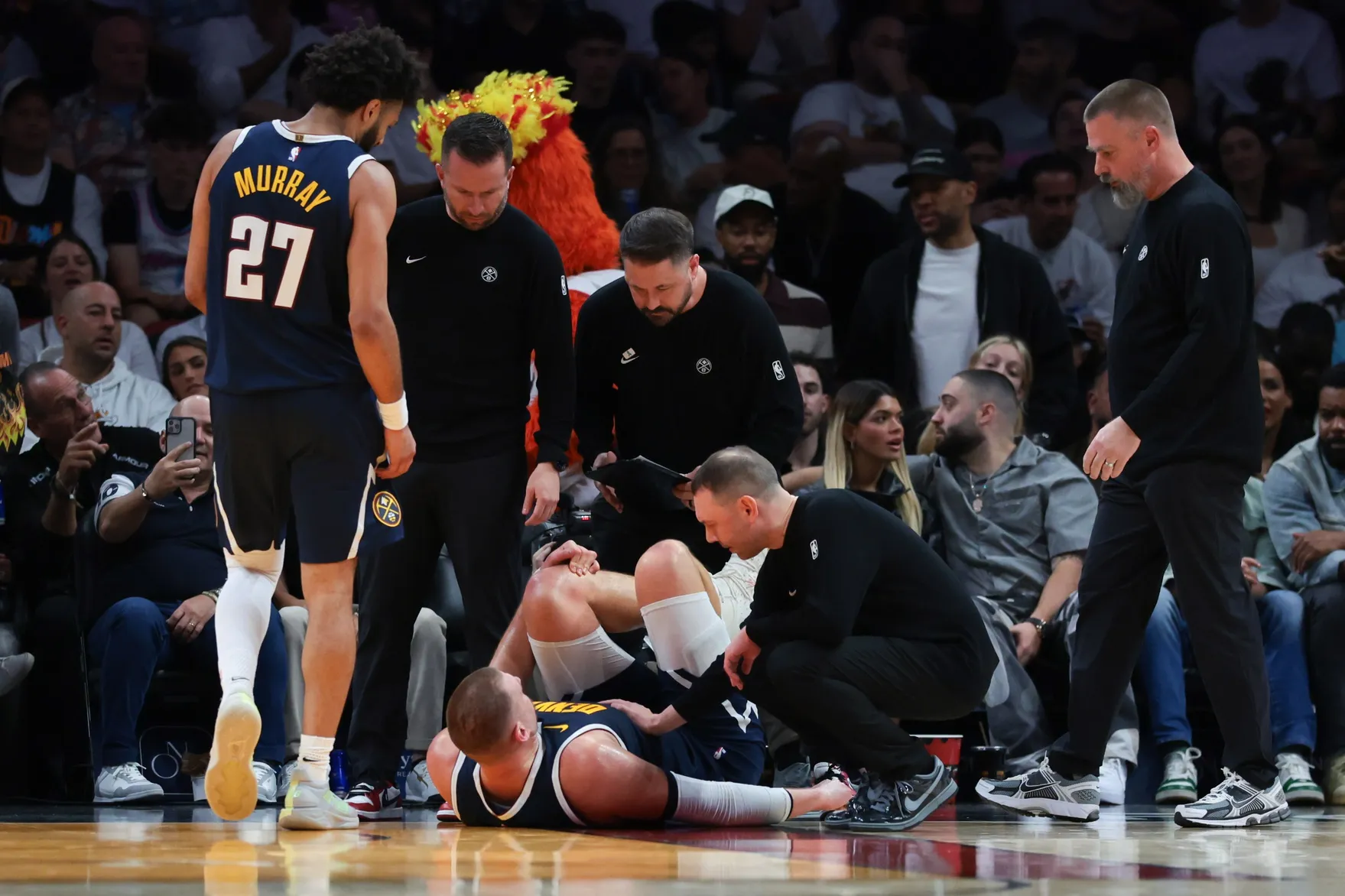 Jokic Injury Casts Shadow Over Nuggets After Loss to Heat